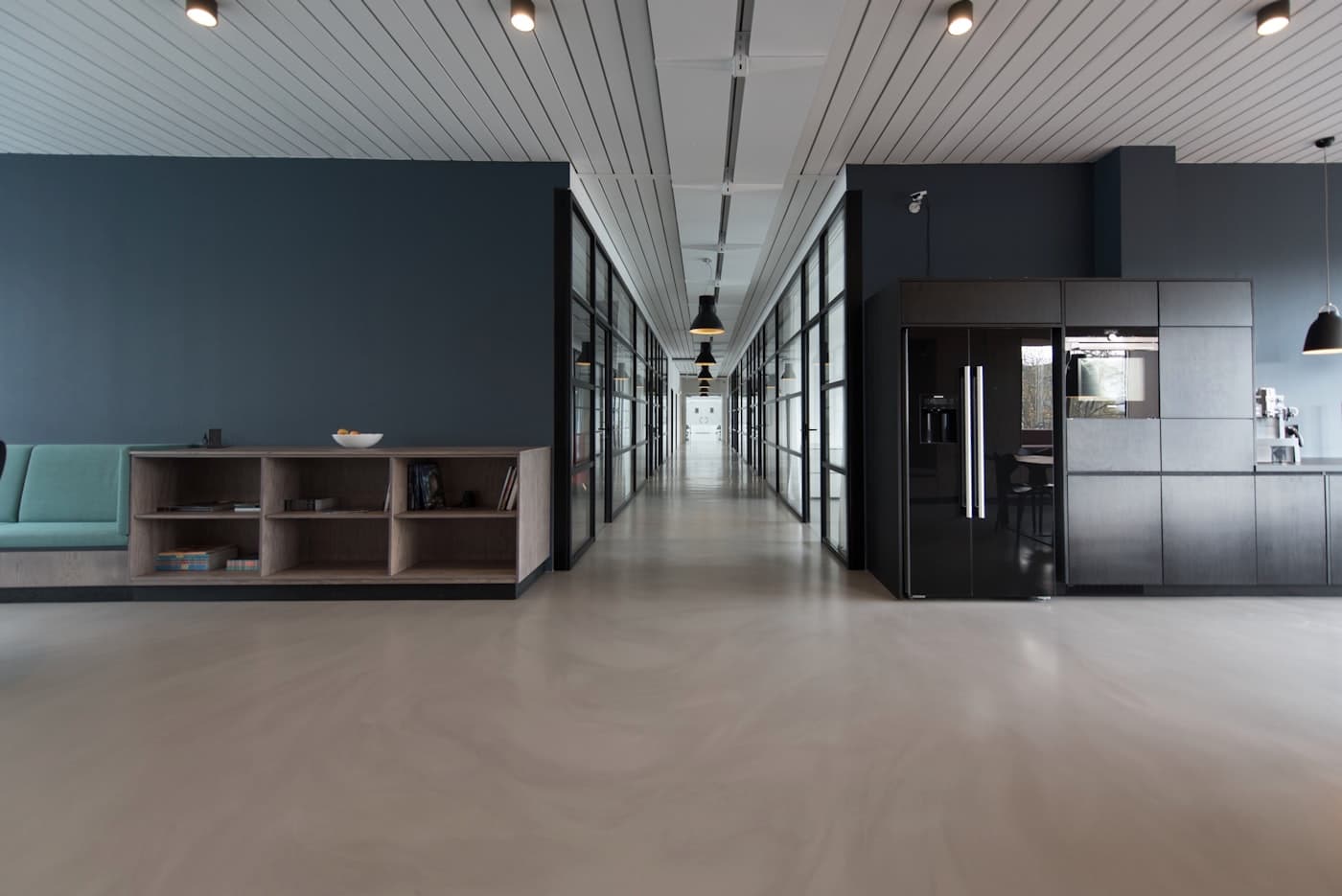 Bright modern workspace with large windows and city views, representing a controlled professional environment